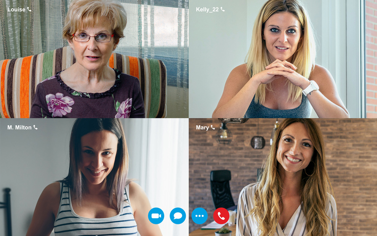 Group video call screen with four women