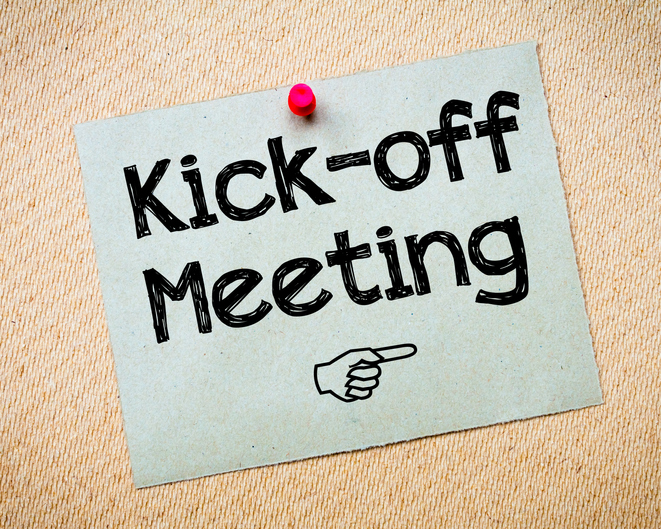 Kick-off meeting Message. Recycled paper note pinned on cork board. Concept Image